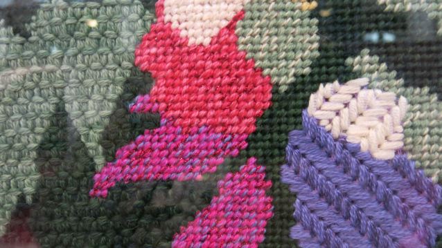 Closeup image of needlepoint stitches.