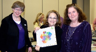 New president Gloria M., center, with treasurer Terri D., left, and Madonna O.